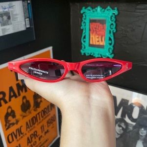 Skinny 1990s style red sunglasses